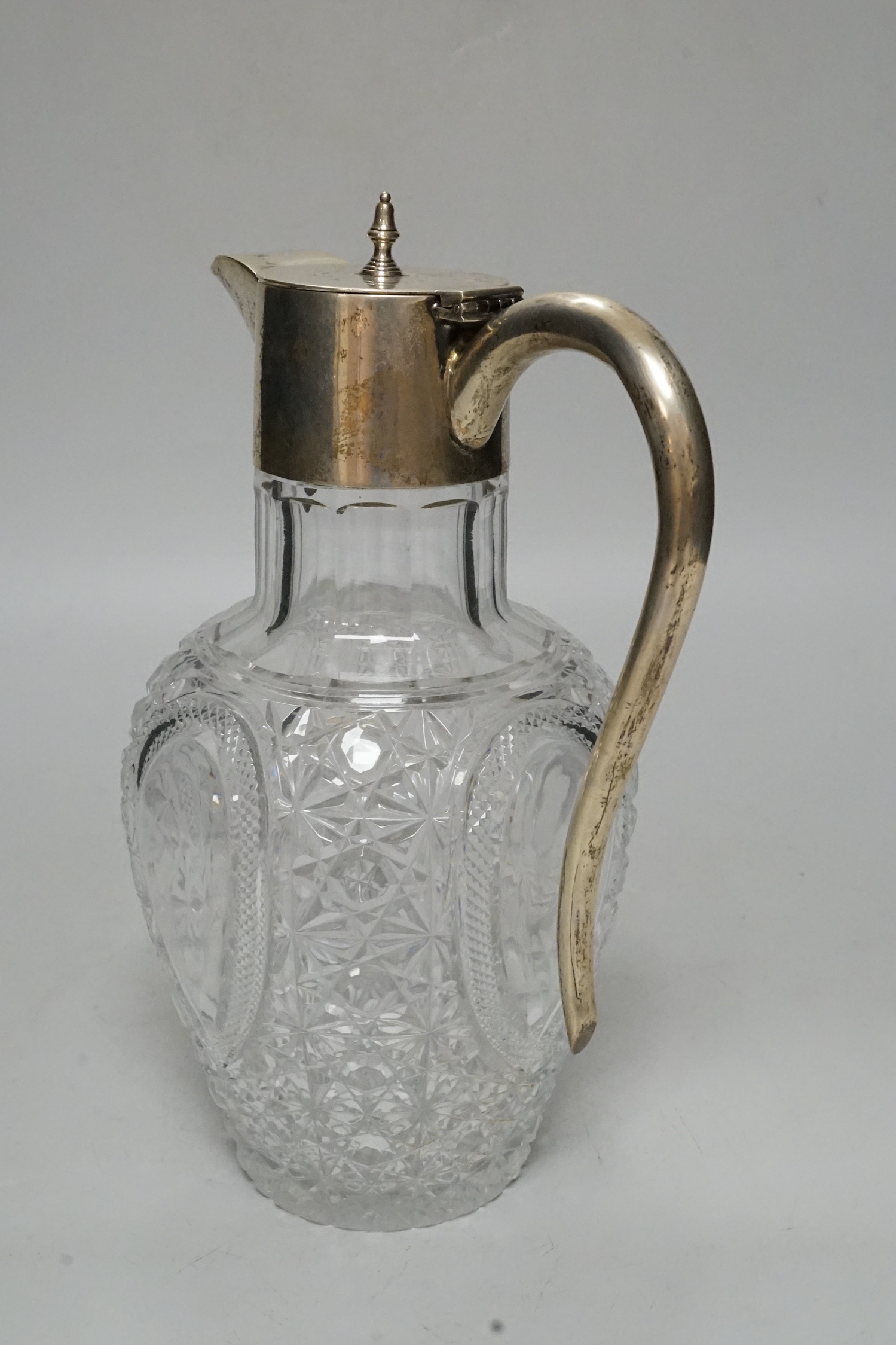 An Edwardian silver mounted cut glass claret jug, G. Loveridge & Co, Birmingham, 1904, 23cm